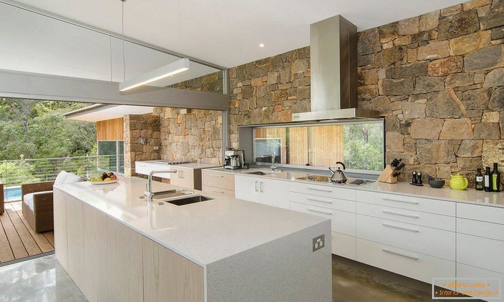 Kamień we wnętrzu kuchni в стиле модерн
