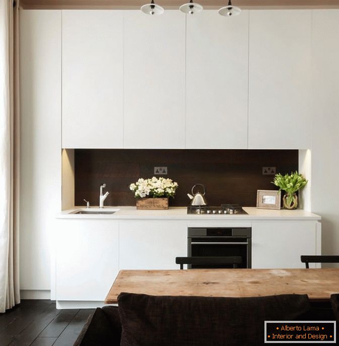 Kuchnia apartament-studio w nowoczesnym stylu