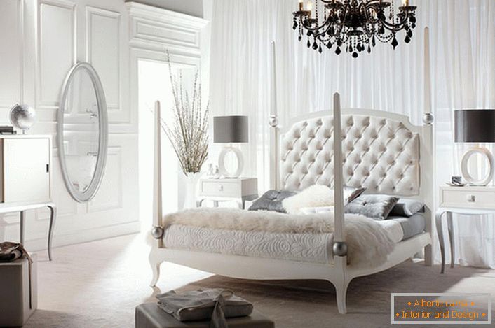 Luksusowa, stylowa sypialnia w stylu Art Nouveau z odpowiednio dobranym oświetleniem. Niewystarczające oświetlenie sztuczne tworzy romantyczne zmierzchu w pokoju.