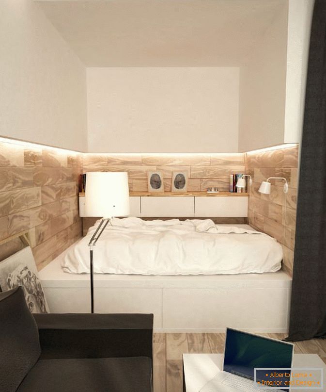 Sypialnia za zasłoną w małym apartamencie typu studio