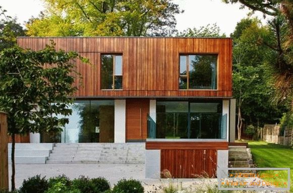 Piękny design elewacji prywatnego domu - zdjęcie dwupiętrowego domu