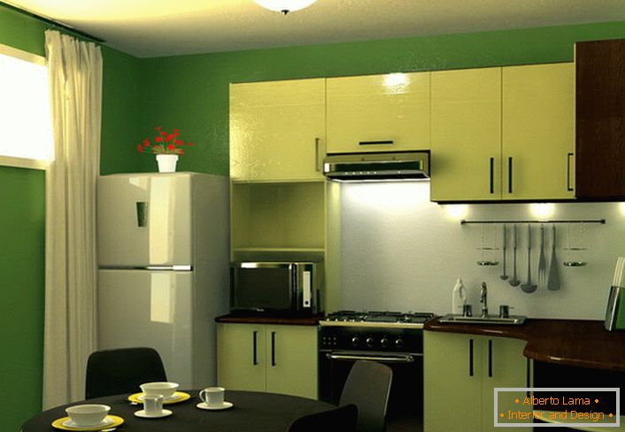Zielony to kolor spokoju i harmonii. Powierzchnia kuchni 9 m kw. W tym zestawieniu kolorystycznym - doskonałe rozwiązanie do projektowania każdego mieszkania w mieście.