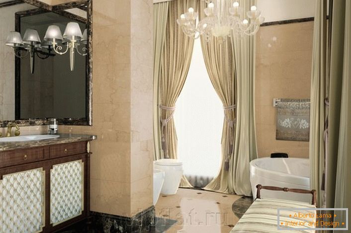 Szlachetną dekorację łazienki w stylu neoklasycyzmu podkreślają odpowiednio dobrane meble.