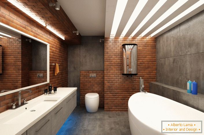 Symulacja cegły w łazience w stylu loftu harmonijnie łączy się ze śnieżnobiałymi meblami.