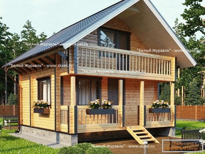 Dom jest wykonany z laminowanego drewna z tarasem i dużym balkonem. Projekt KB-1.