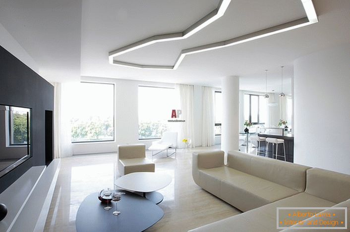 Przykład prawidłowego doboru oświetlenia do salonu w stylu minimalizmu. Zgodnie z wymogami stylu w tworzeniu wnętrz stosuje się kształty geometryczne i ścisłe linie.