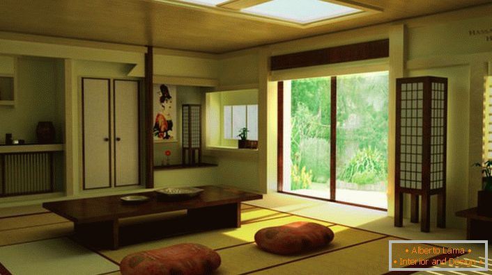 O obecności japońskiego minimalizmu w salonie w wiejskim domu mówi właściwe meble. Niski stół jest idealny do domowego picia herbaty. 