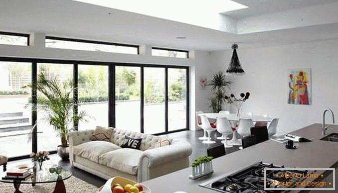 Designerskie apartamenty typu studio z panoramicznymi oknami - zdjęcie kuchni salonu