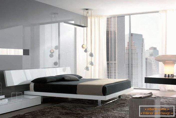 Błyszczące powierzchnie o metalicznym połysku sprawiają, że sypialnia hi-tech jest bardziej przestronna i lekka.