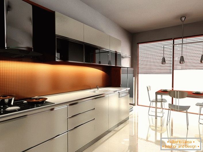 Przygaszone światło w nowoczesnej kuchni sprawia, że ​​atmosfera jest romantyczna. Efekt uzyskuje się za pomocą rolet, które zakrywają panoramiczne okna.